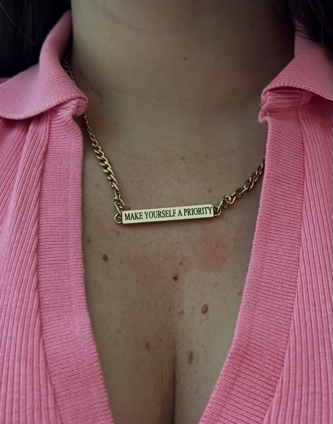 Collana groumette con targa.